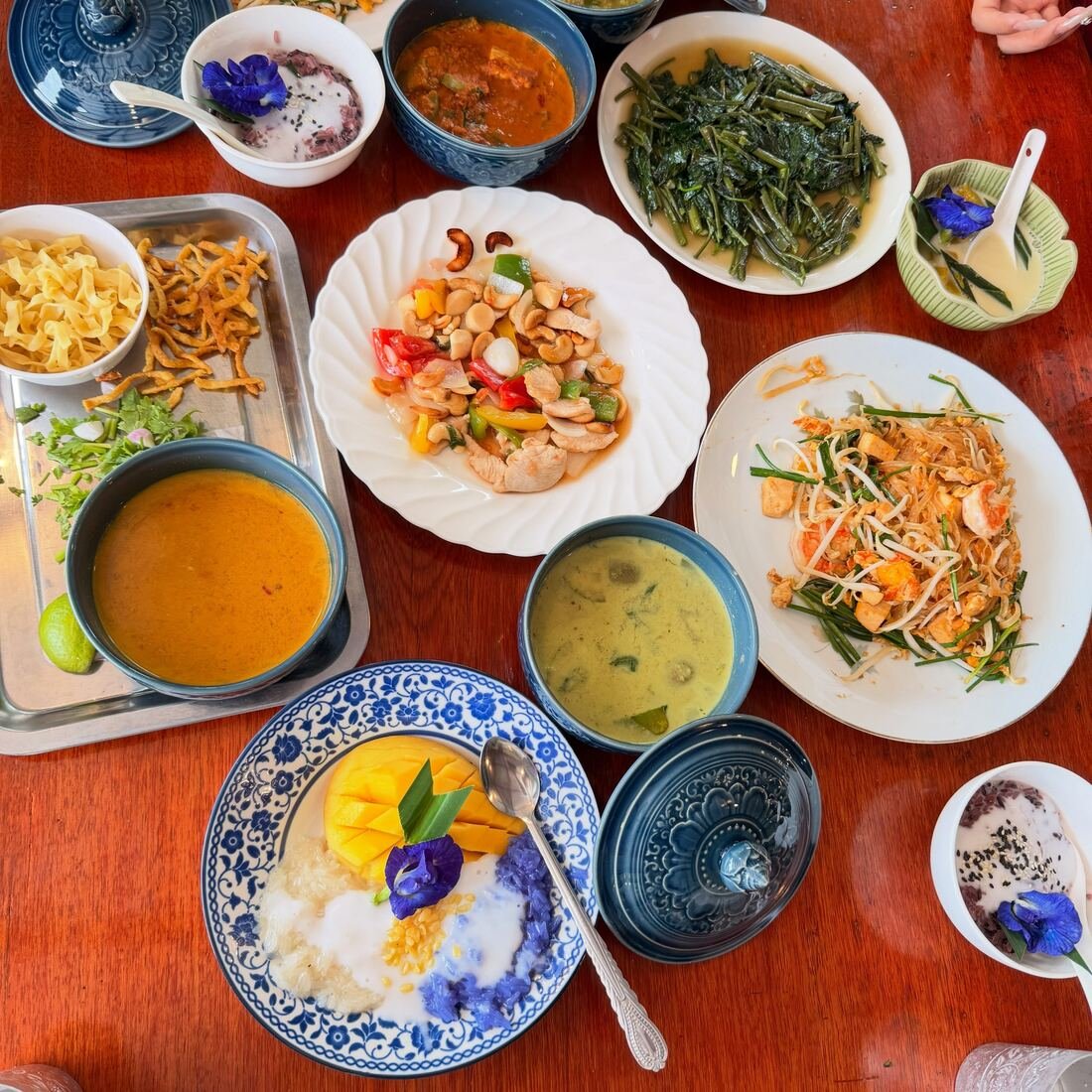 A full set of Thai dishes including mango sticky rice at Baan Farm Thai Cooking School
