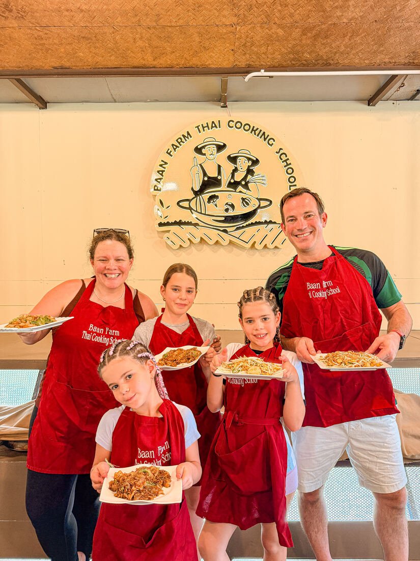 A family cooking class group at Baan Farm Thai Cooking School