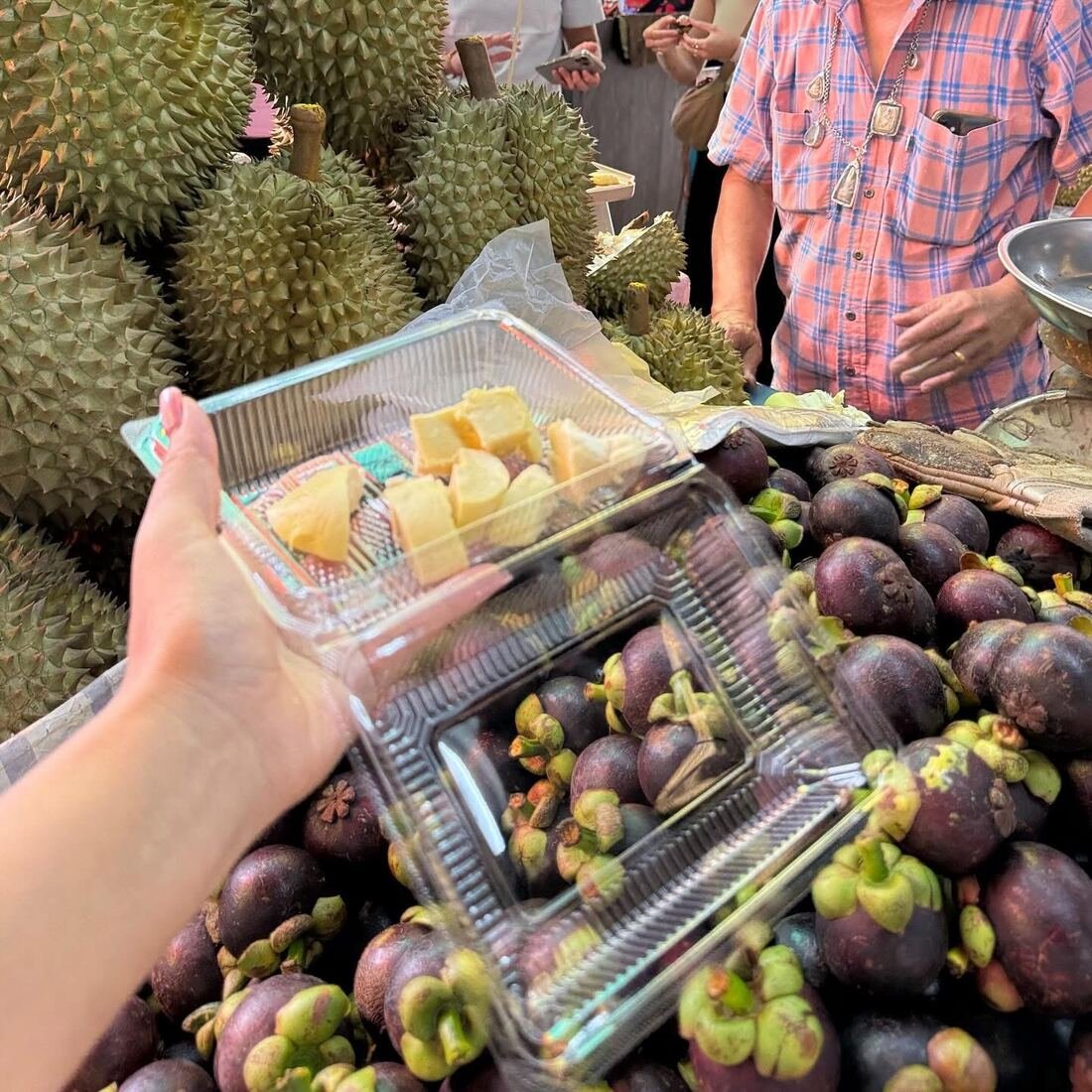Fresh mangosteen and tropical fruit at the local market visited by Baan Farm guests